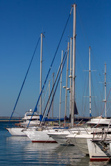  yachts moored  in a marina.