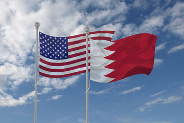 USA and Bahrain flag waving in the sky