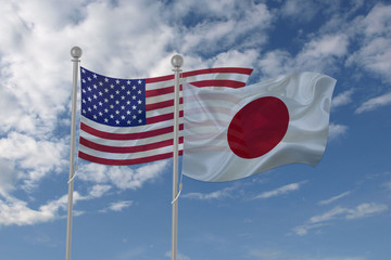 USA and Japan flag waving in the sky