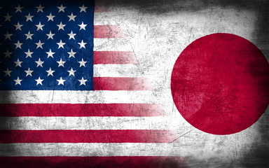USA and Japan flag with grunge metal texture