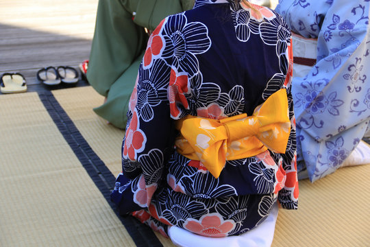 Colorful Japanese kimono and footwear on the tatami mat