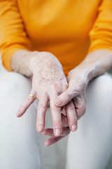 Senior woman with hand pain