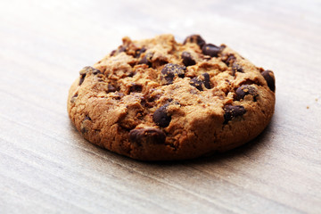 Chocolate cookies on wooden table. Chocolate chip cookies shot