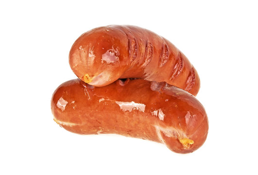 Two grilled sausages on a white background