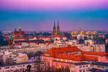 Fototapeta premium Panorama illuminated old town of Wroclaw at night. Popular travel destination in Poland. High dynamic range.