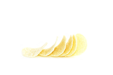 Scattered chips on white background