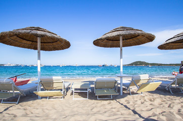 Straw umbrellas on the beach