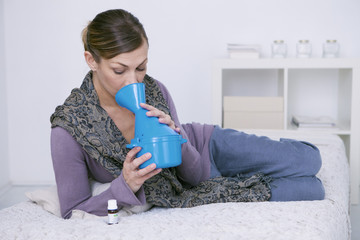 Woman doing inhalation