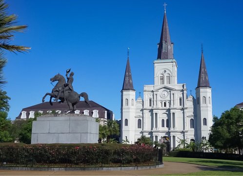 The St Louis Cathedral and statue of Andrew Jackson on horse in Jackson Square of the French Quarter in New Orleans, Louisiana