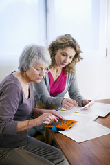 Fototapeta premium Senior woman with her carer