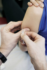 Fototapeta premium Vaccinating a woman