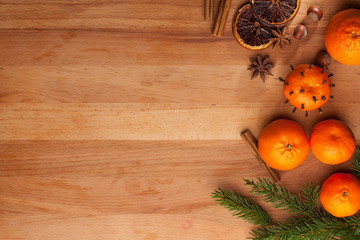 Mulled wine ingredients on wooden table.