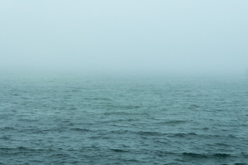 Choppy water foggy morning