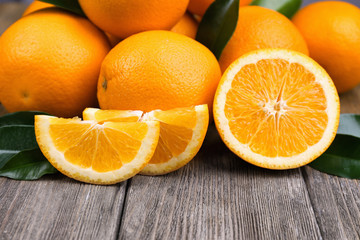 Fresh oranges on table