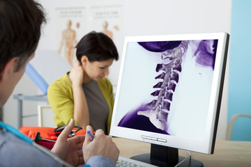 Models On screen, colorized x-ray of cervical vertebrae