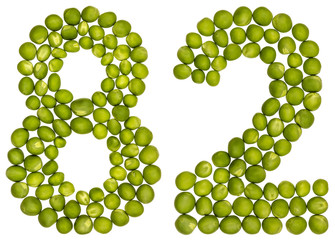 Arabic numeral 82, eighty two, from green peas, isolated on white background