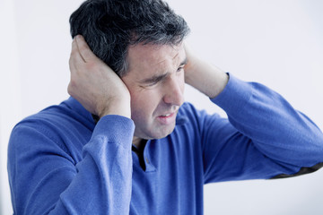 Man suffering from earache