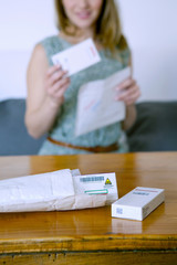 Woman receiving medicines bought on internet