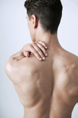 Naklejka premium Shoulder pain in a man