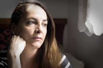 Portrait of a woman thinking.