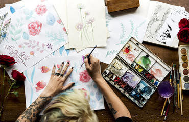 Rear View of Artist Woman Working Painting Flowers Water Color on Papers