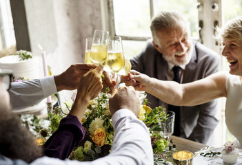 Group of Diverse People Clinking Wine Glasses Together Congratulations Celebration