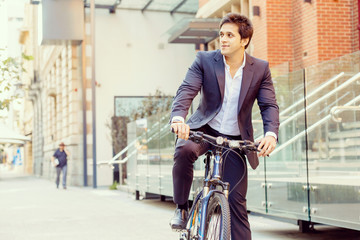 Successful businessman with bicycle