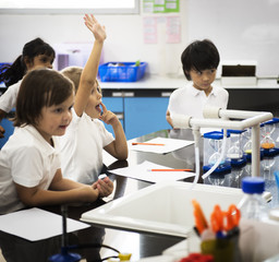 Diverse kindergarten students learning study in classroom