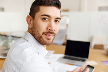 Young man in offfice