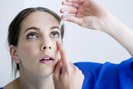Woman using eyewash