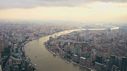 Huangpu river in Shanghai Bund at sunset. 