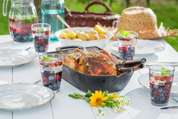 Homemade dinner with potatoes and chicken served in white table