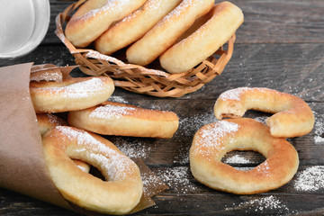 Sweet donuts on wooden background