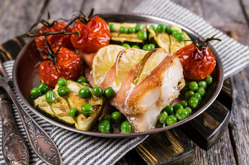 Baked fish with vegetables