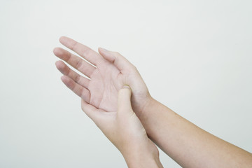 Naklejka premium Model The Do In is an automassage technique of chinese origin, then imported in Japan This technique is based on the pressure of certains points (acupressure) aiming at correcting body disorders Pressure of the point Thenar Eminence Aim: treatment of insomnia, vertigo, relieve back pain