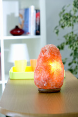 Himalayan salt crystal lamp Once lighted, the crystal lamp spread a soft red/orange light favorable to relaxation