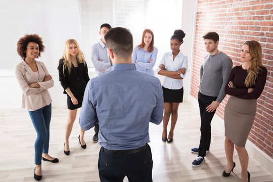 Manager Having Conversation With His Business Colleagues