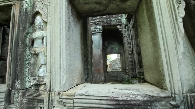 emple doorways, smooth diagonal tracking shot, Prasat Kravan temple in Angkor Wat area, Cambodia