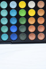 collection of make up and cosmetic beauty products arranged