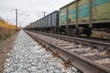 Railway road and trees in yellow colors
