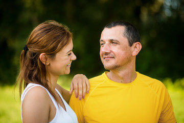 Obraz premium Mature father with adult daughter outdoors.