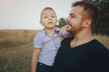 young family with a child have fun outdoors