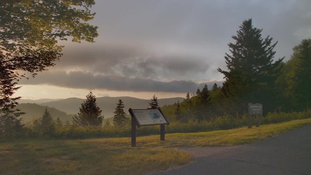 Beartrap Gap Overlook on the Blue Ridge Parkway at Sunrise Viewing Over Appalachian Mountain Forest Layers near Asheville North Carolina