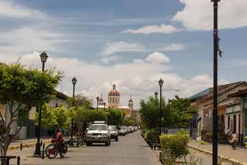 GRANADA, NICARAGUA - APRIL 12, 2017: Street view of La Calzada, the most popular tourist street in town.