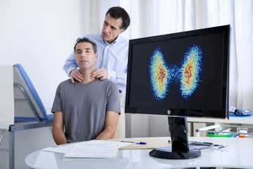 Doctor examining patient's thyroid - obrazy, fototapety, plakaty