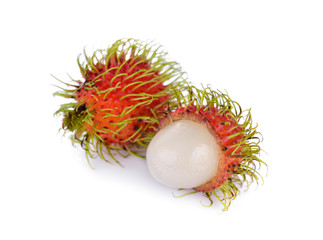 whole and peeled fresh rambutan on white background