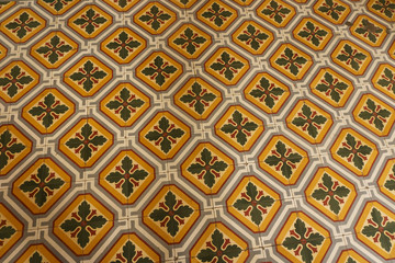 Colonial house architecture Vintage floor tiles with orange, green, white as a decorative design pattern
