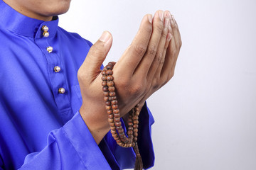 Muslim Praying with Tasbih