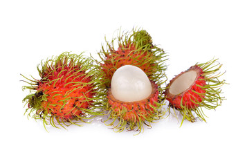 whole and peeled fresh rambutan on white background