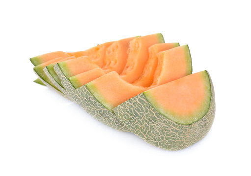 sliced melon on white background